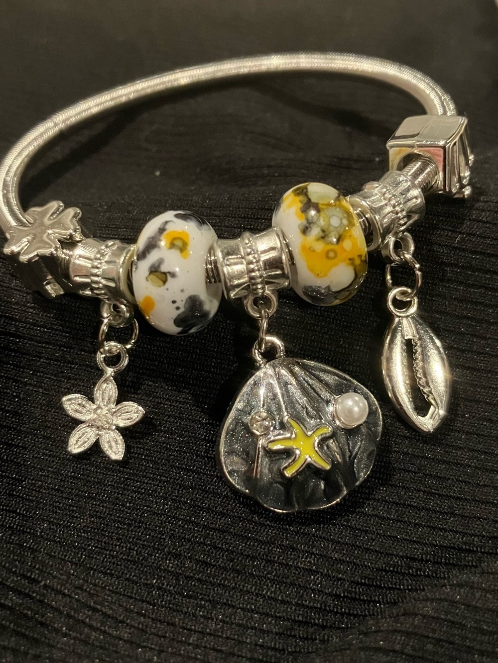 Silver Charm Bracelet with White and Yellow Glass Beads